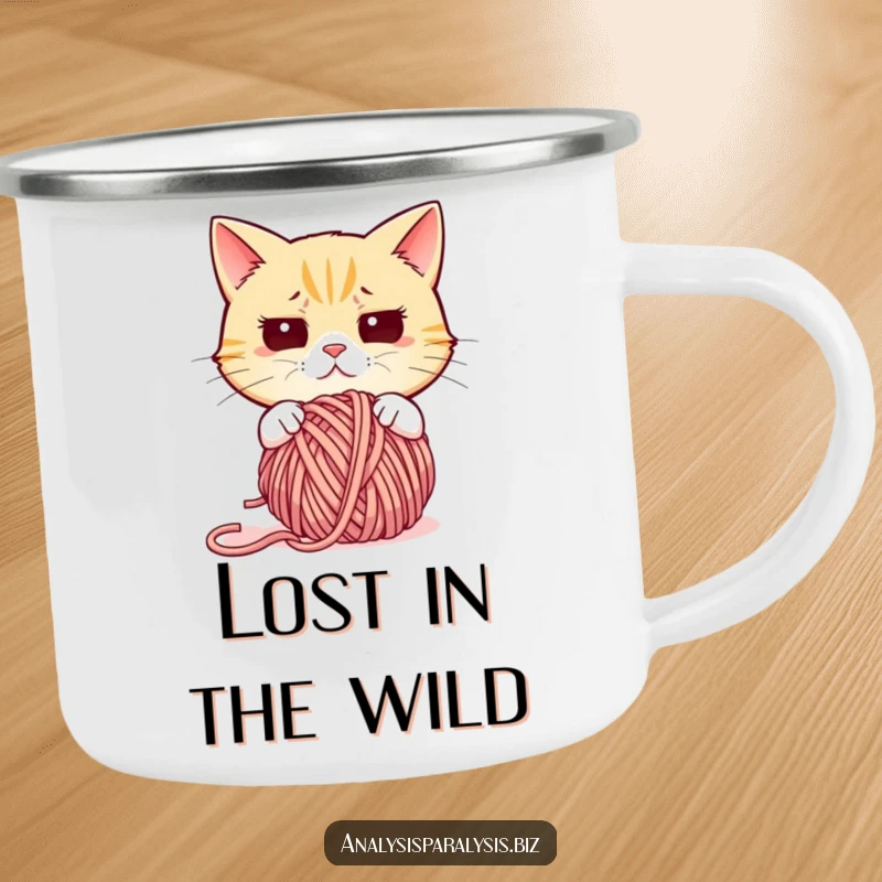 Funny cat camping mug featuring a confused cat looking perplexed at a tangled ball of yarn, ready for outdoor adventures.