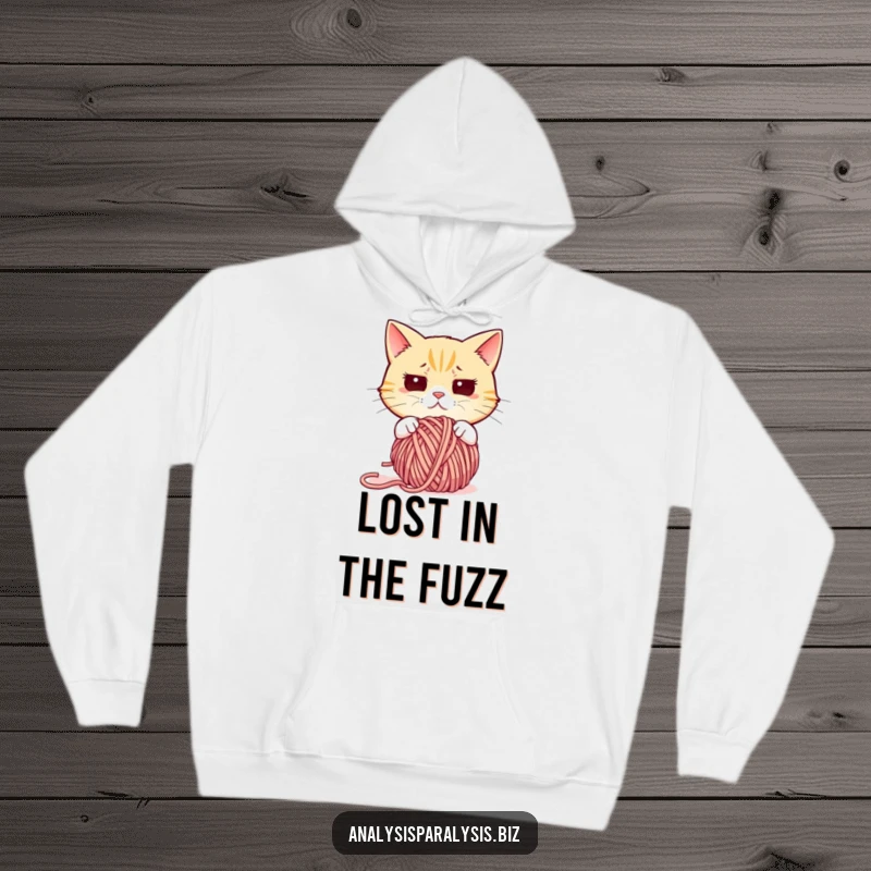 Funny cat hoodie showing a cat looking utterly lost and confused while staring at a massively tangled ball of yarn.
